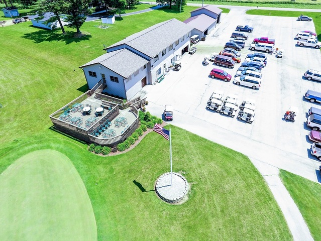 15523 Henry Road Morrison, IL 61270 - Photo 9 of 16 an aerial view of a house with a garden and trees