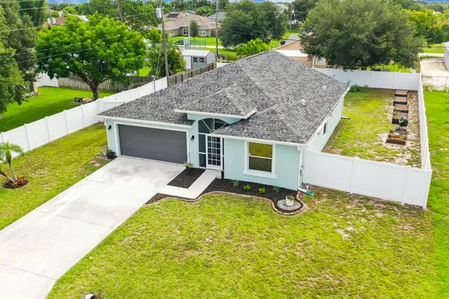 a aerial view of a house with garden
