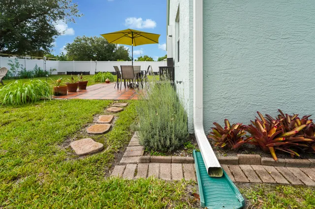 swimming pool view patio and outdoor seating