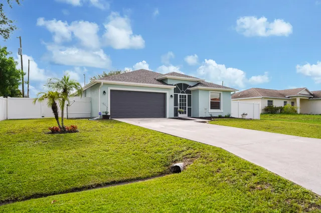 a view of a house with a swimming pool