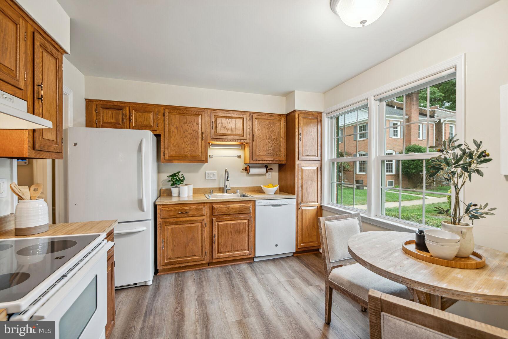 7067 Leestone Street Springfield, VA 22151 - Photo 11 of 39 Kitchen - Brand New Luxury Vinyl Plank Flooring!