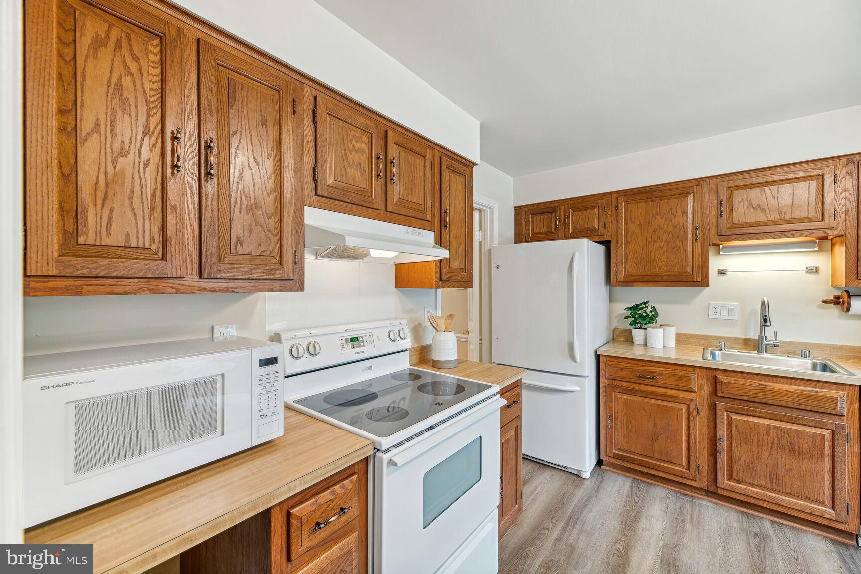 7067 Leestone Street Springfield, VA 22151 - Photo 12 of 39 Kitchen Receives Bright Southern Sun Exposure!