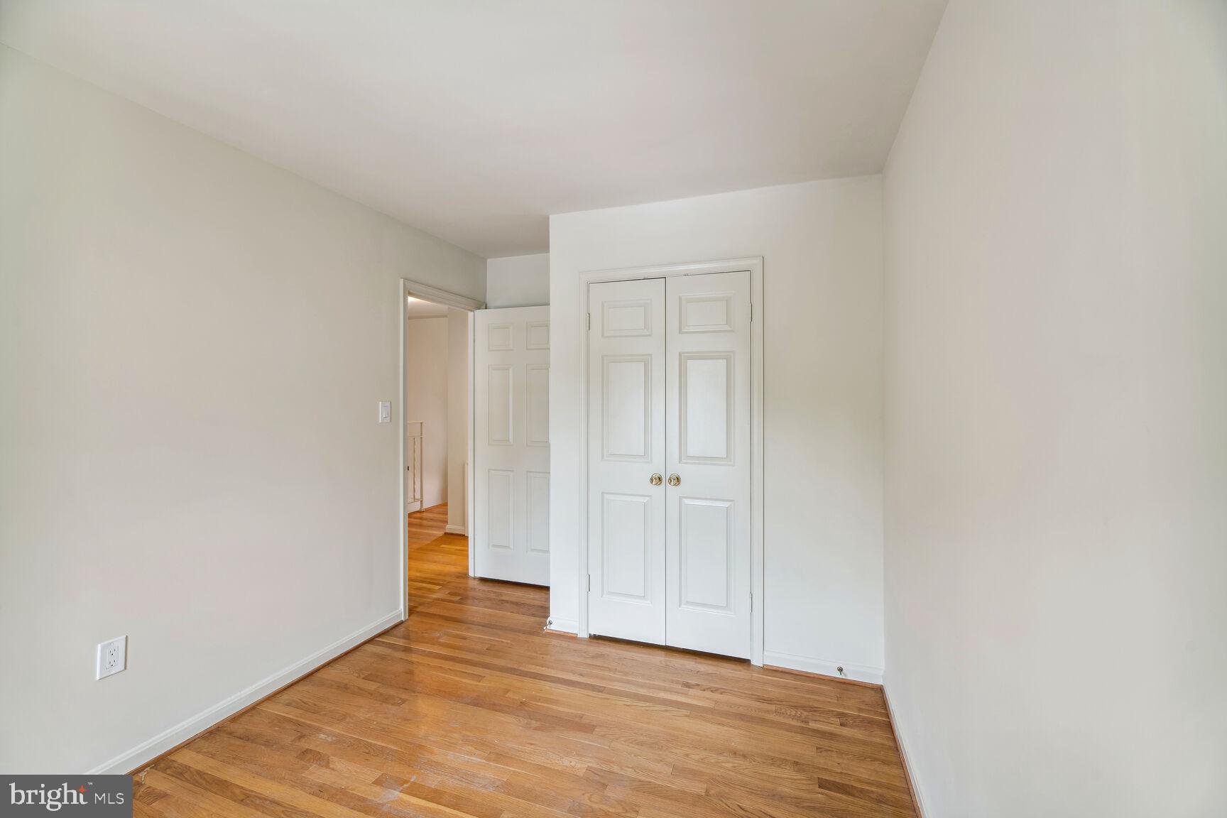 7067 Leestone Street Springfield, VA 22151 - Photo 23 of 39 Bedroom #2 - Hardwood Floors & Fresh Paint!