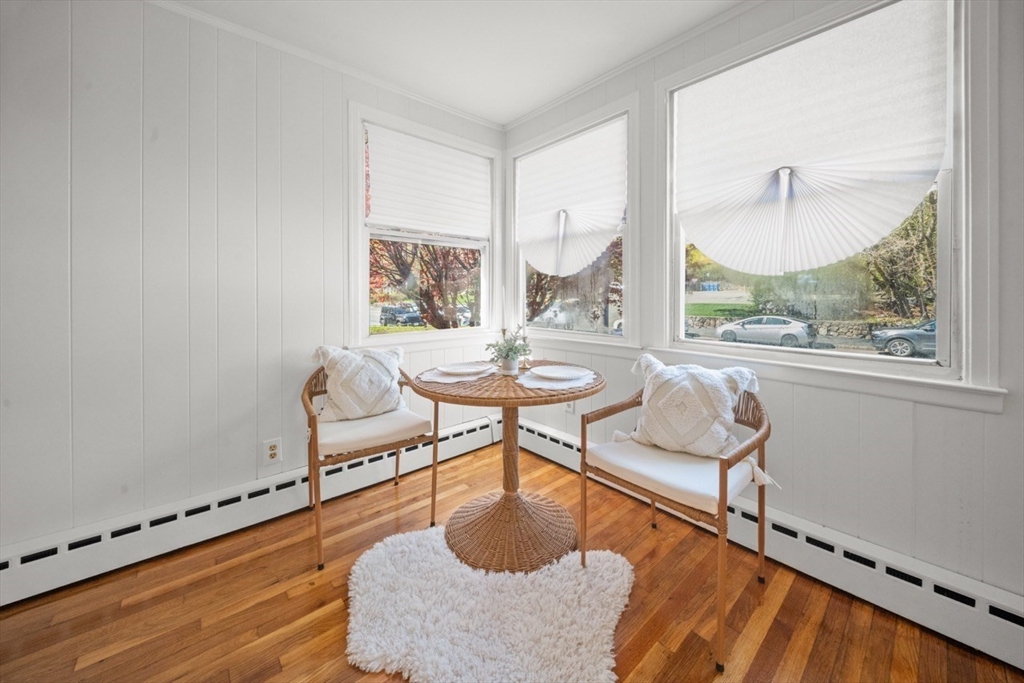 1180 Main Street, Unit 1 Waltham, MA 02451 - Photo 4 of 30 a living room with furniture and a window