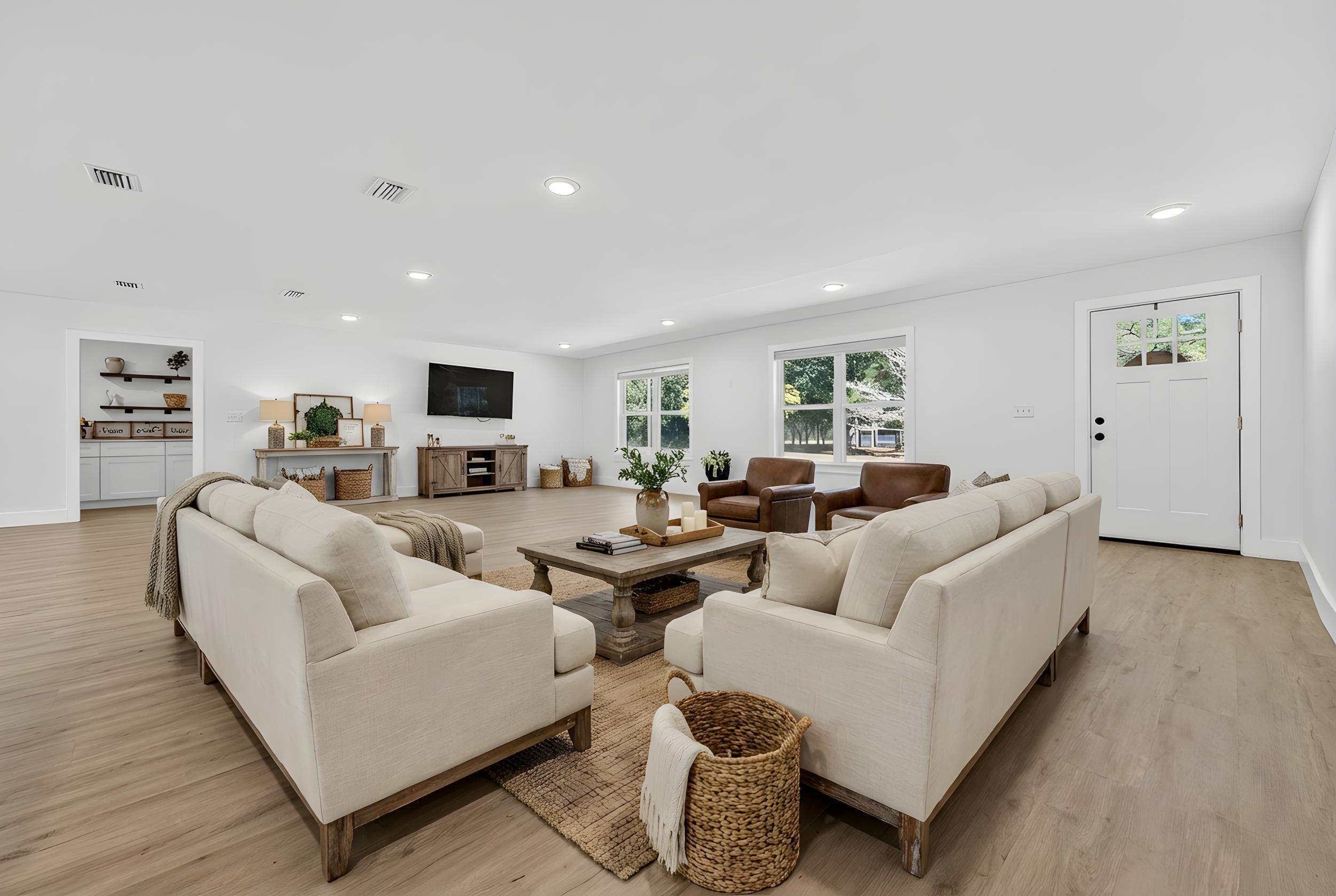 4734 Haybarn Road Holt, FL 32564 - Photo 15 of 56 a living room with furniture and a flat screen tv
