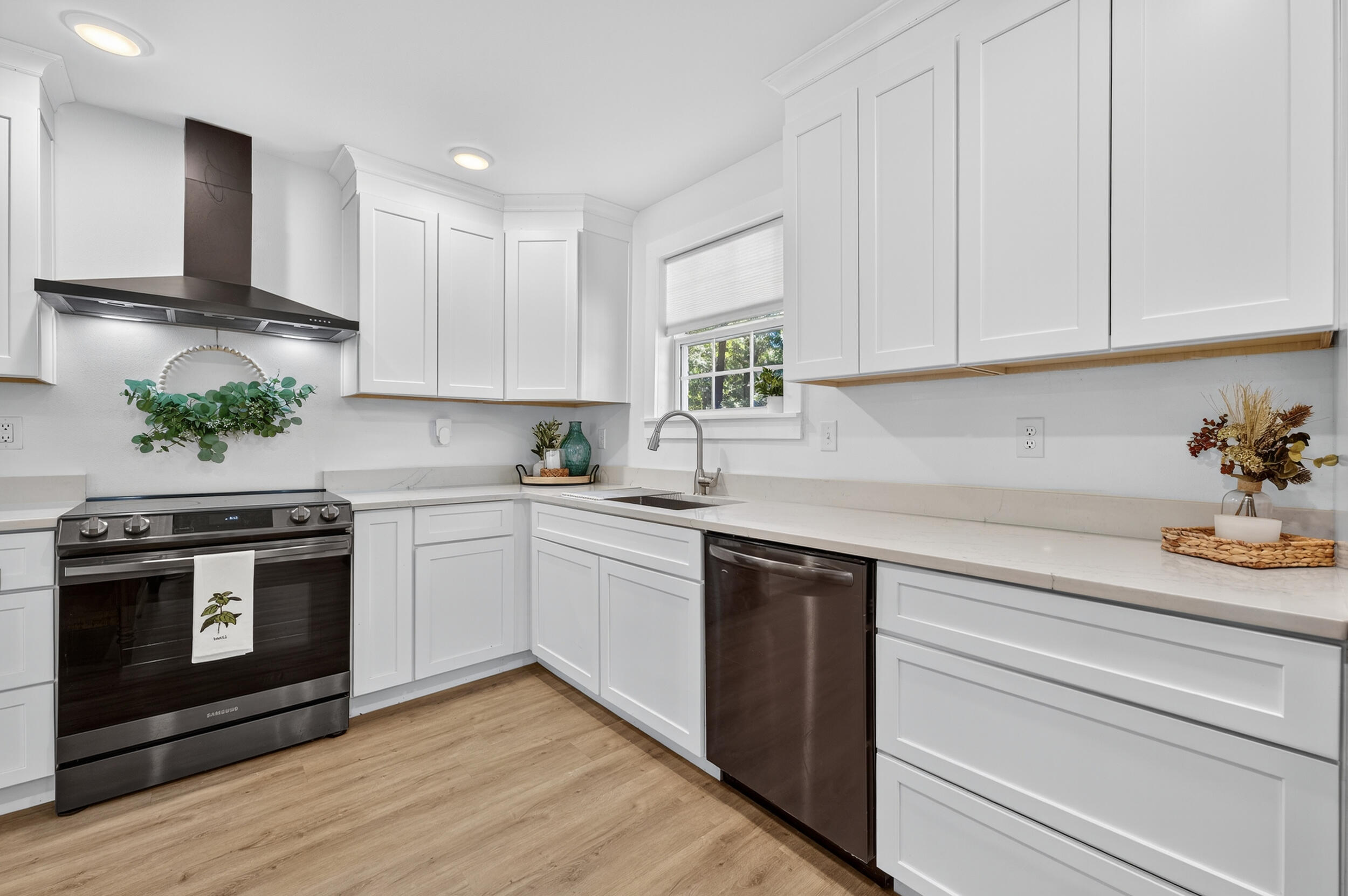 4734 Haybarn Road Holt, FL 32564 - Photo 16 of 54 a kitchen with stainless steel appliances granite countertop a sink dishwasher a stove and a refrigerator