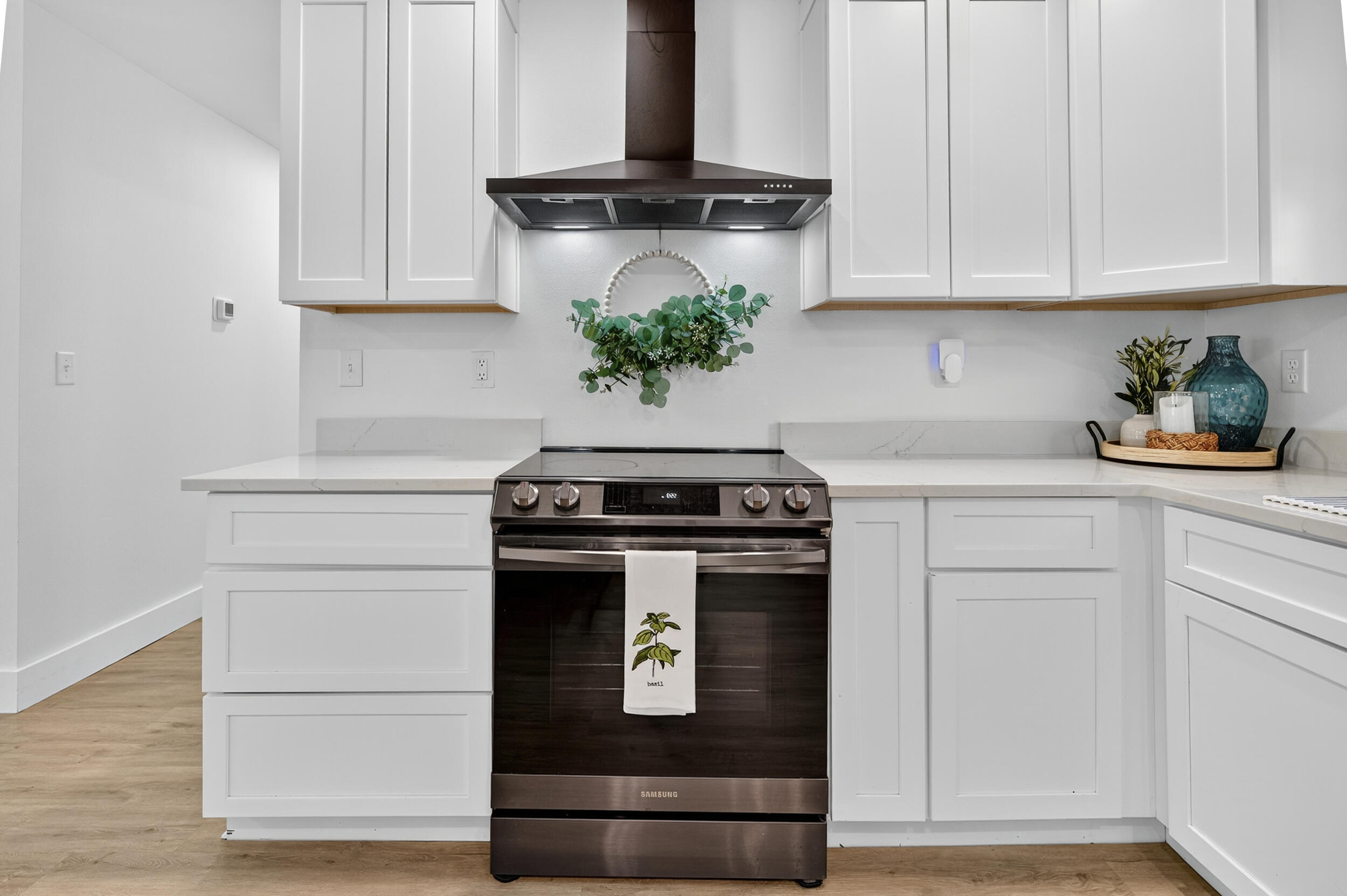 4734 Haybarn Road Holt, FL 32564 - Photo 16 of 56 a stove top oven sitting inside of a kitchen