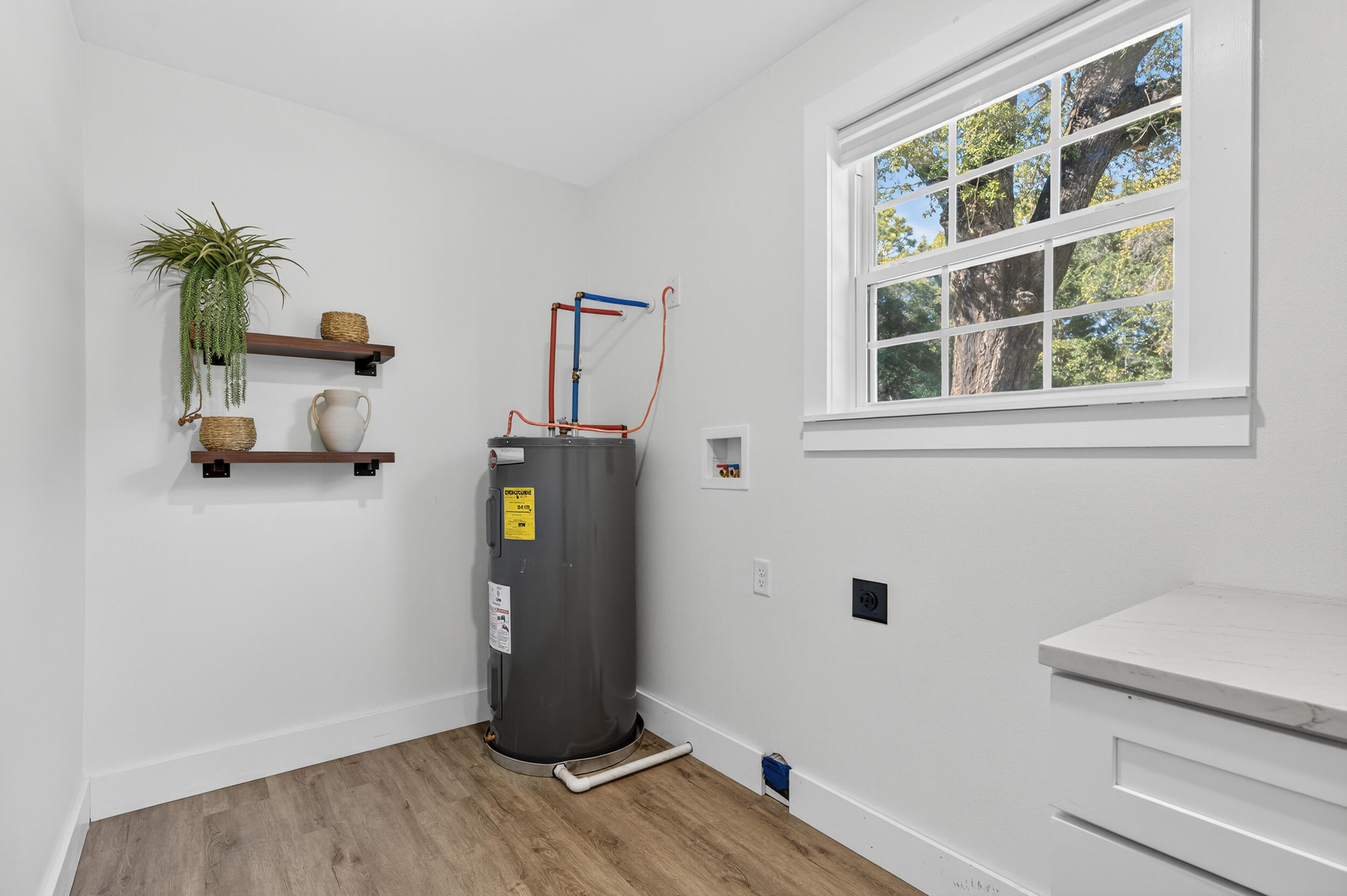 4734 Haybarn Road Holt, FL 32564 - Photo 19 of 54 wooden floor in an empty room