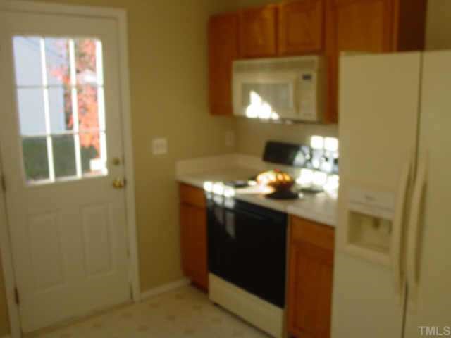 2224 Springhill Avenue Raleigh, NC 27603 - Photo 4 of 7 a bathroom with a sink and a mirror