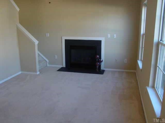 2224 Springhill Avenue Raleigh, NC 27603 - Photo 6 of 7 a view of empty room with front door