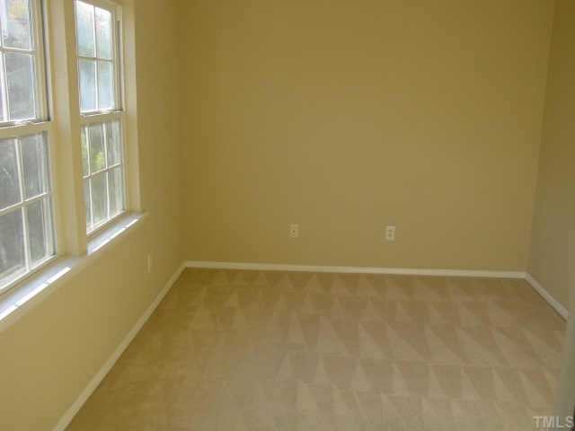 2224 Springhill Avenue Raleigh, NC 27603 - Photo 7 of 7 a view of an empty room with a window