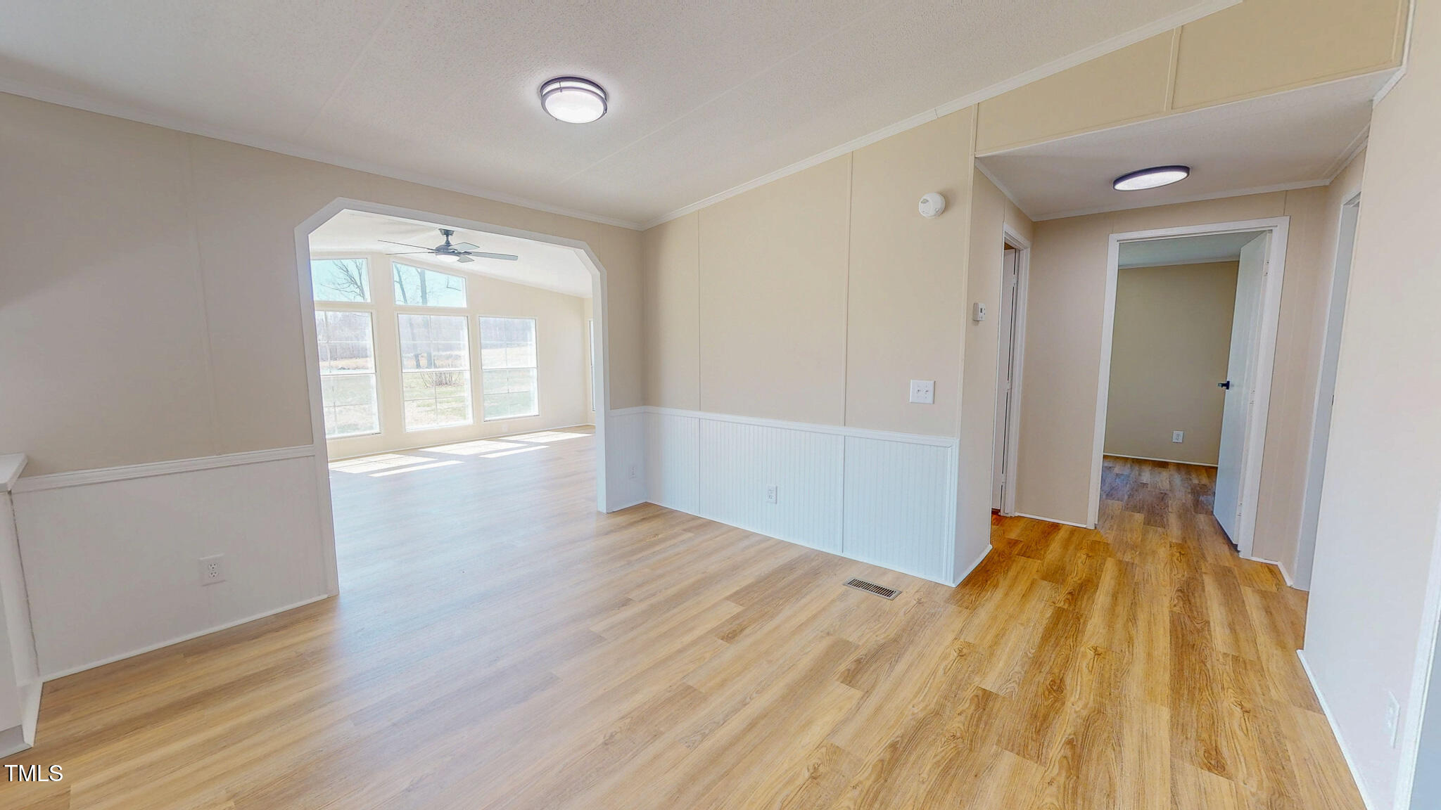210 Holloway Road Roxboro, NC 27573 - Photo 14 of 44 a view of a room with wooden floor and a bathroom