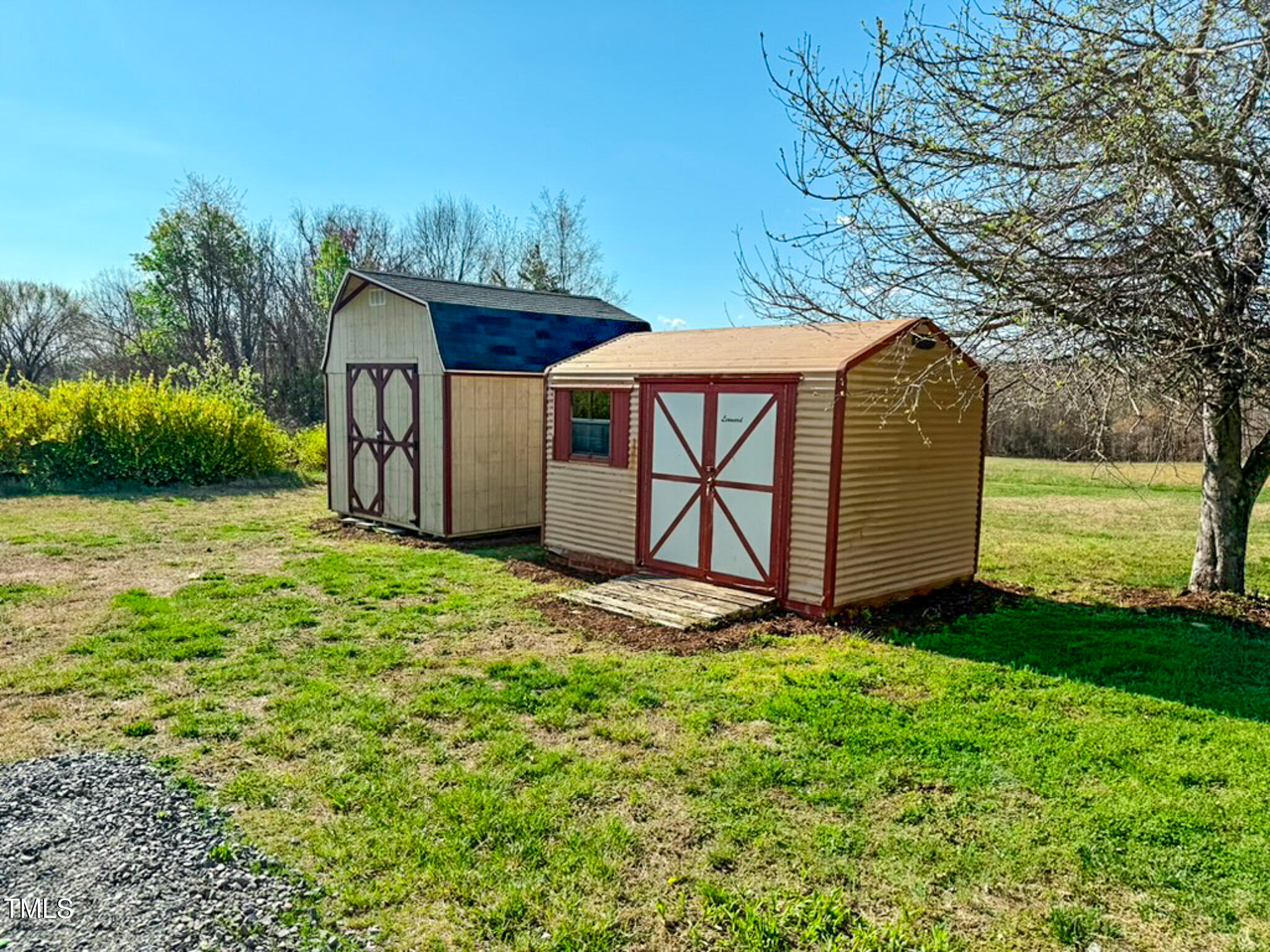 210 Holloway Road Roxboro, NC 27573 - Photo 21 of 44 a backyard of a house with lots of green space