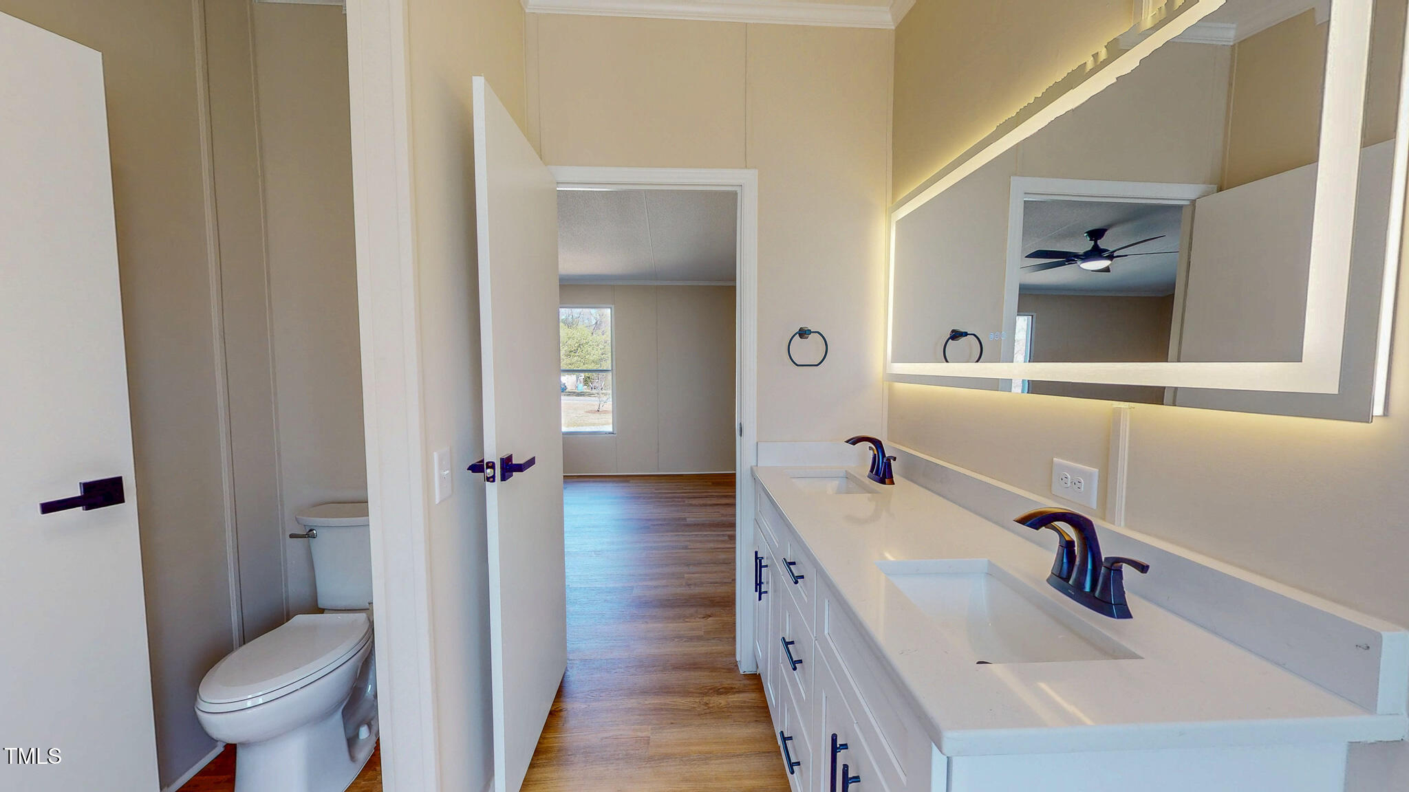 210 Holloway Road Roxboro, NC 27573 - Photo 25 of 44 a bathroom with a sink a toilet and shower
