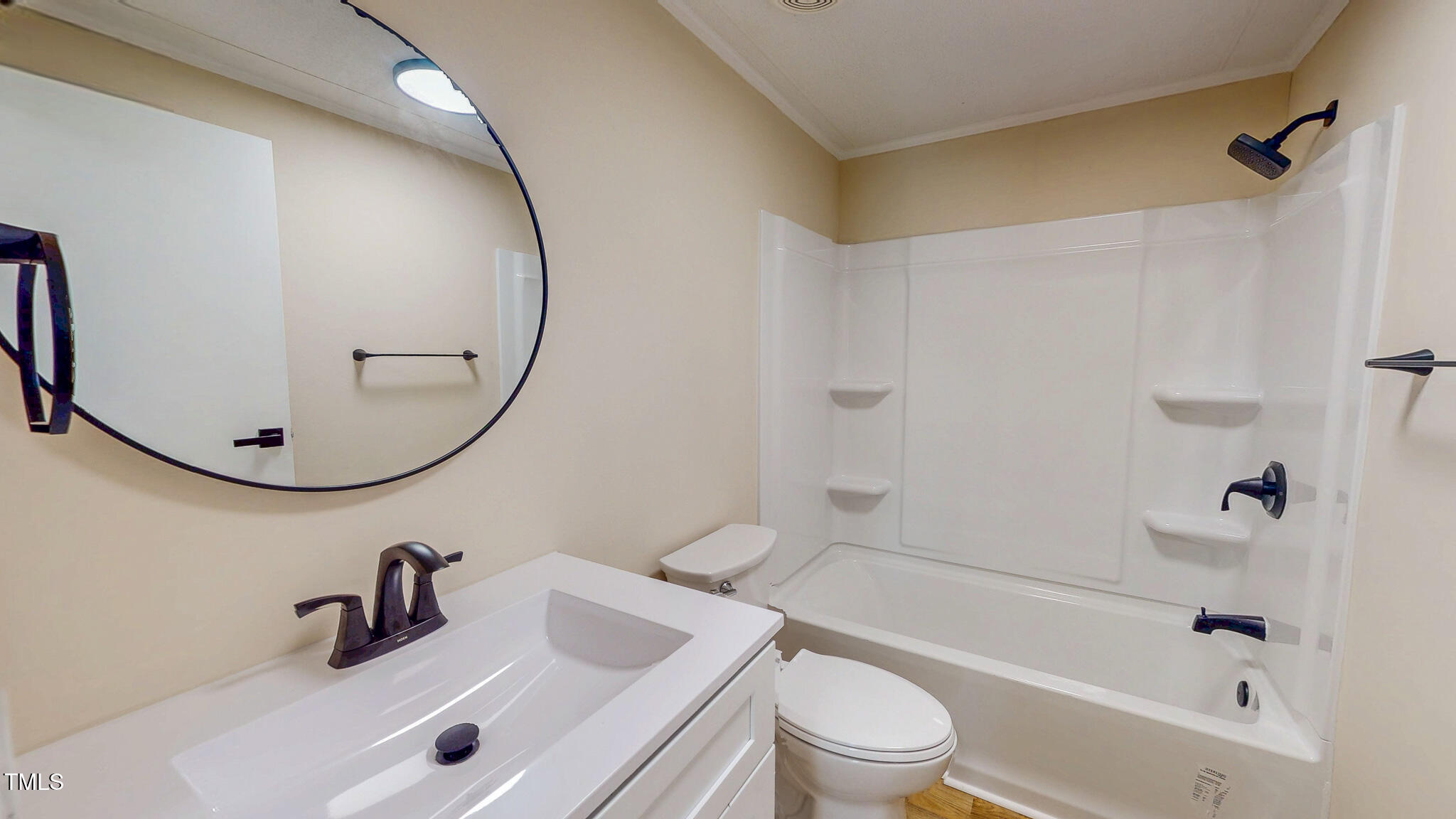 210 Holloway Road Roxboro, NC 27573 - Photo 36 of 44 a bathroom with a sink a toilet and a mirror