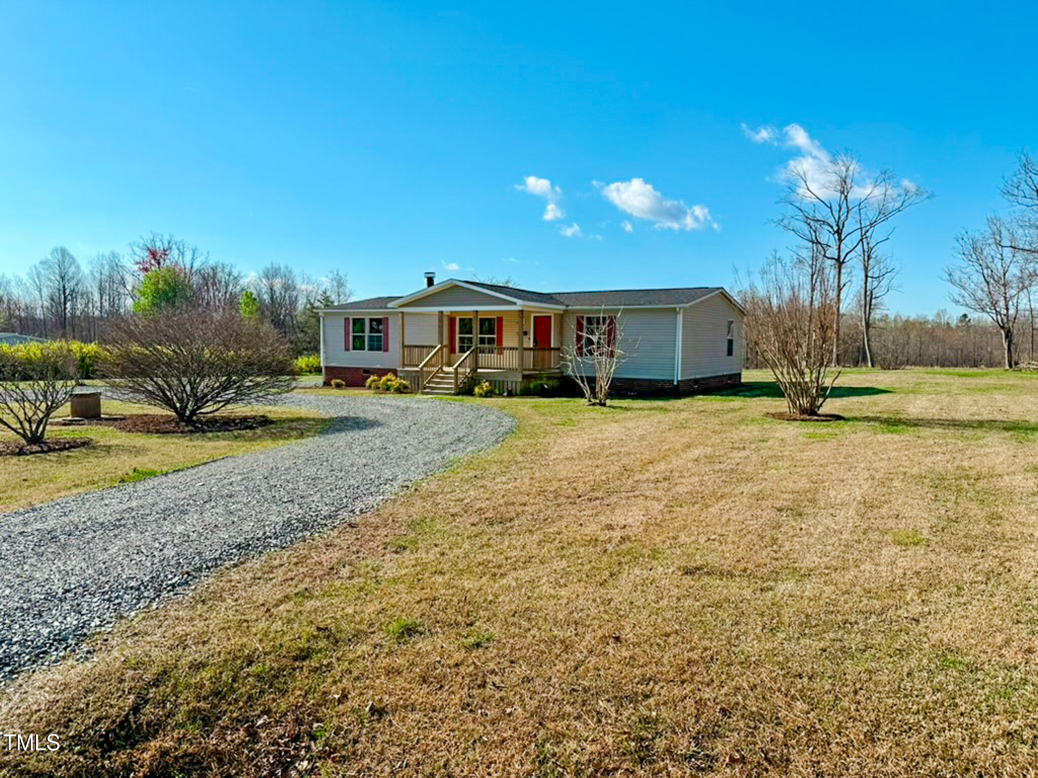 210 Holloway Road Roxboro, NC 27573 - Photo 44 of 44 a view of a house with a yard
