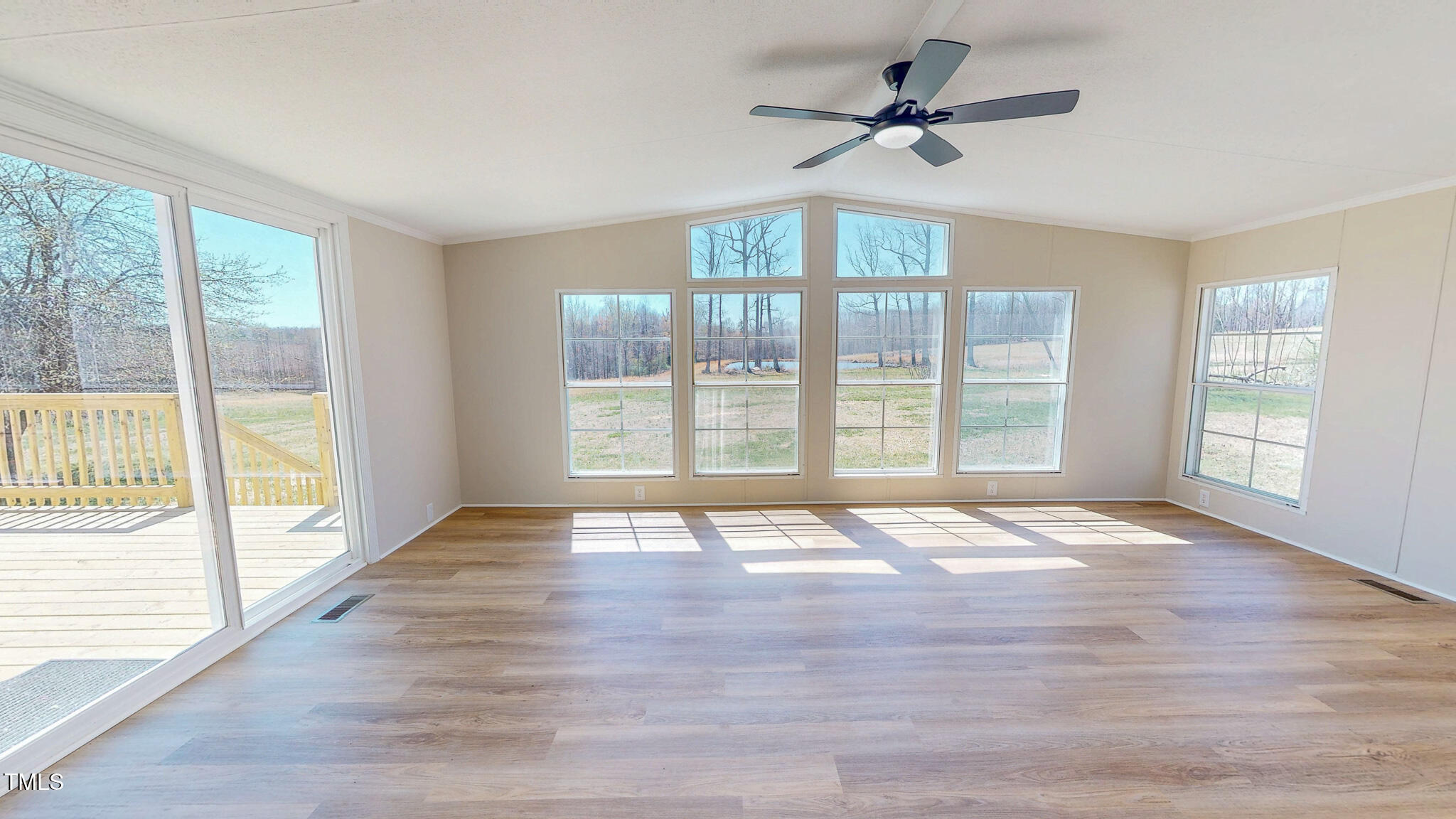 210 Holloway Road Roxboro, NC 27573 - Photo 5 of 44 a view of an empty room with a window