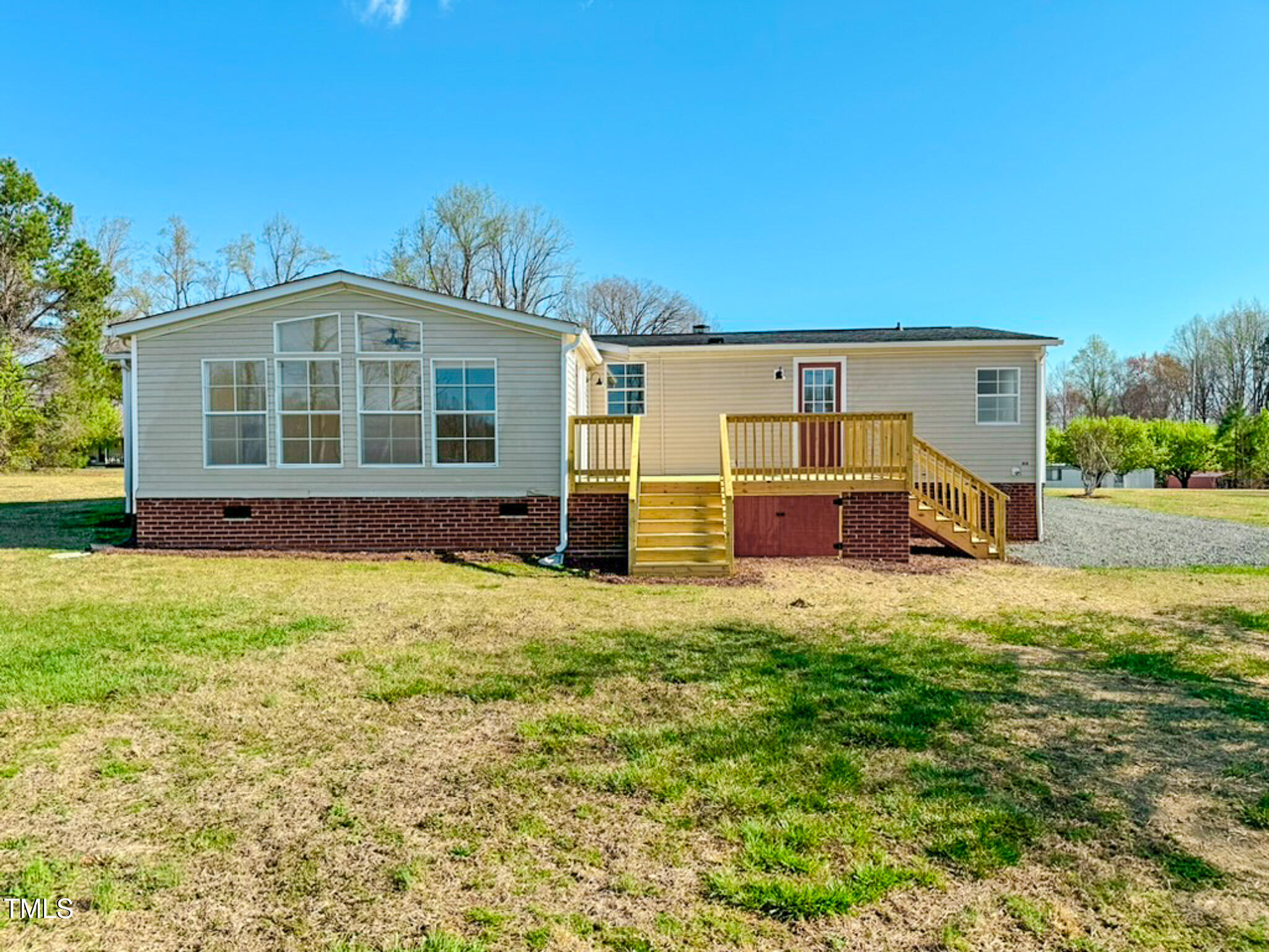 210 Holloway Road Roxboro, NC 27573 - Photo 6 of 44 front view of a house with a yard