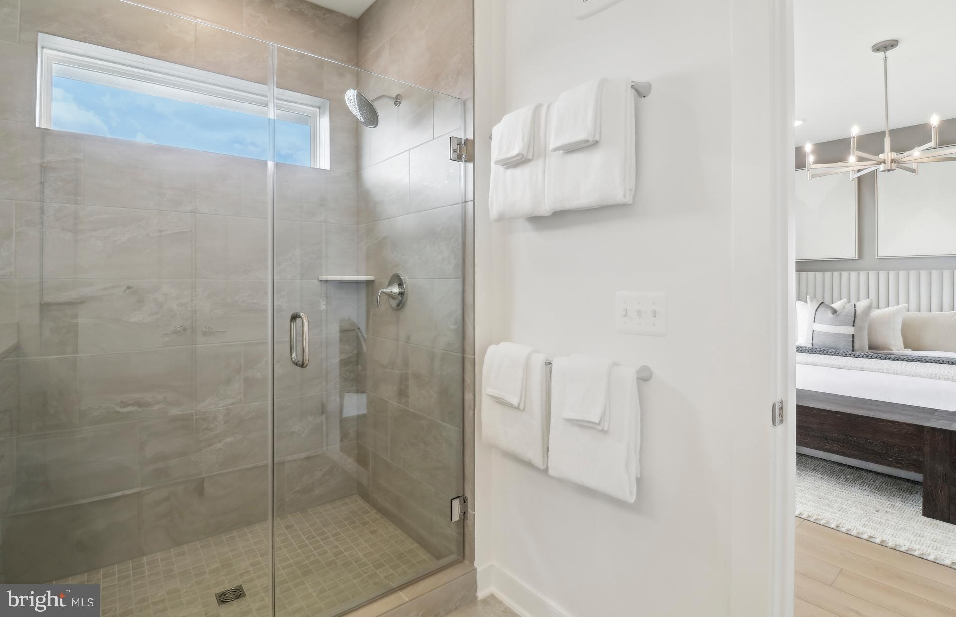 16144 Frederick Road Rockville, MD 20850 - Photo 11 of 32 a bathroom with a shower and a sink