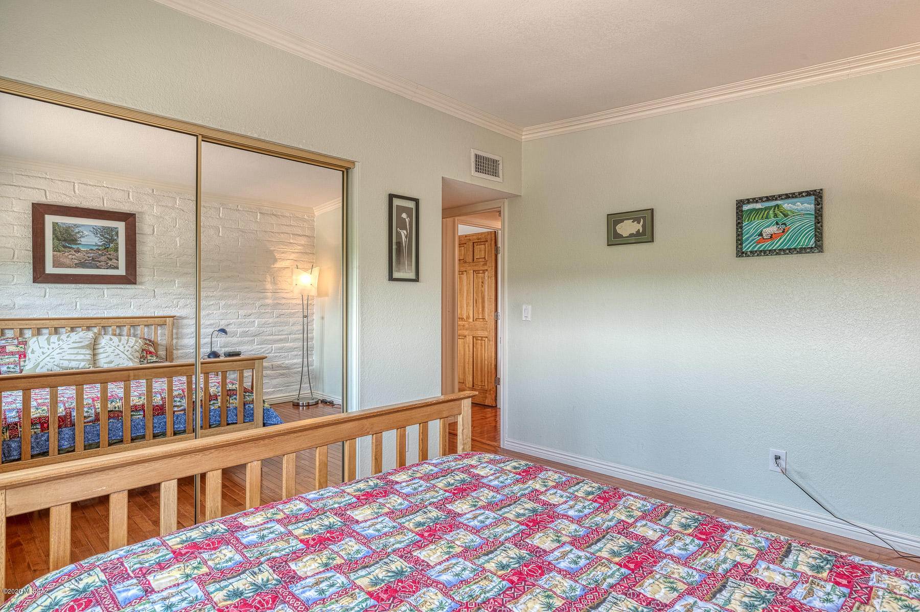 1825 North Old Ranch Road Tucson, AZ 85745 - Photo 20 of 35 a bedroom with furniture and a window
