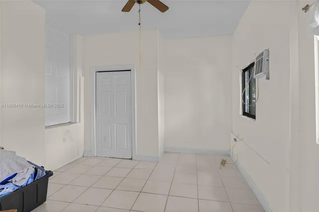 a bathroom with a shower and toilet