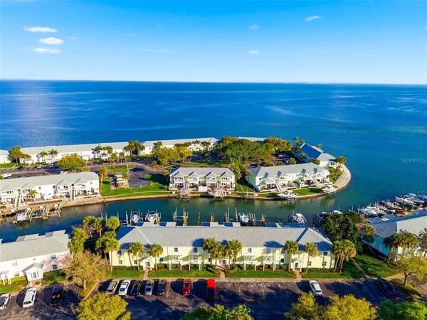 a view of a fruit stand with a variety of fruits and vegetables