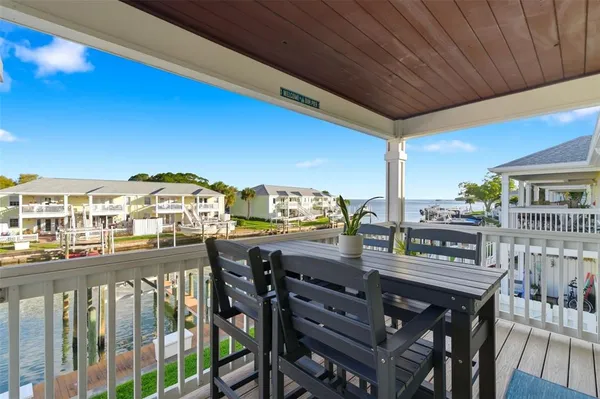 a view of front door of house with a yard