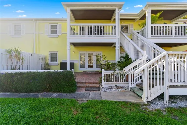 a view of a balcony with chairs