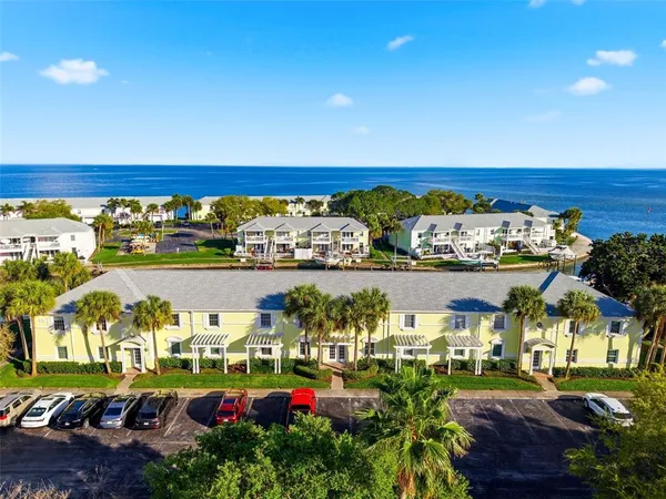 a view of a city with an ocean