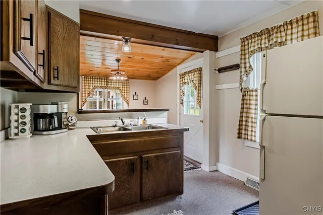 $595,000 | 118 East Avenue, Webb, NY 13331