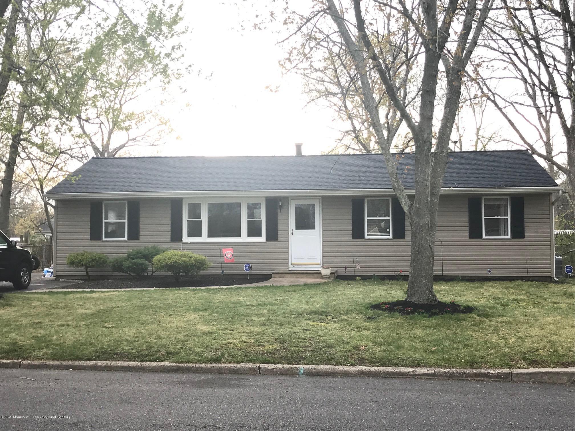 front view of a house and a yard