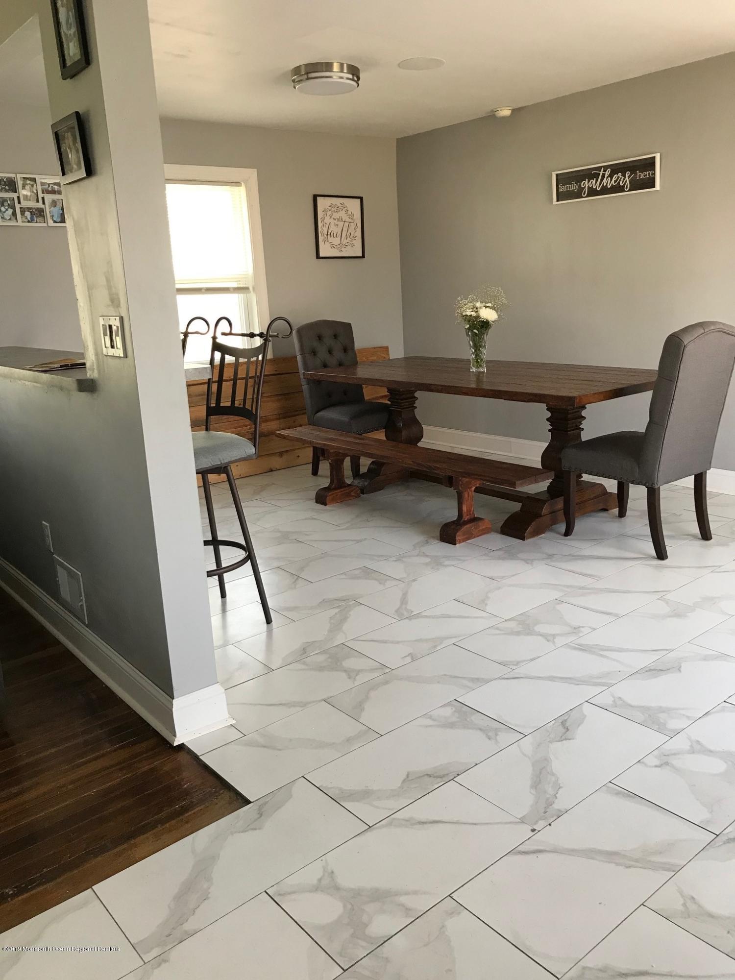 14 Chain Boulevard Bayville, NJ 08721 - Photo 11 of 17 a living room with furniture and a rug