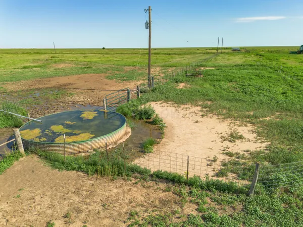 a view of a lake with a big yard
