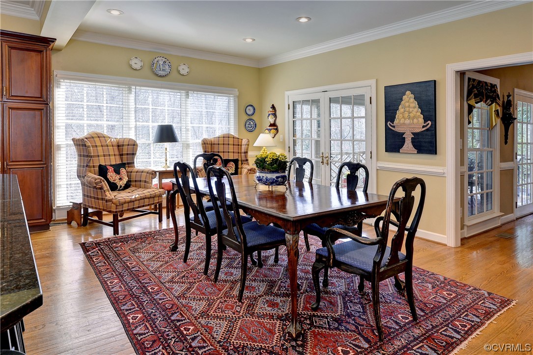 101 Spring Branch Williamsburg, VA 23185 - Photo 11 of 44 a view of a dining room with furniture and wooden floor