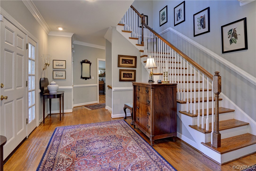 101 Spring Branch Williamsburg, VA 23185 - Photo 17 of 44 a view of a hallway with wooden floor and staircase
