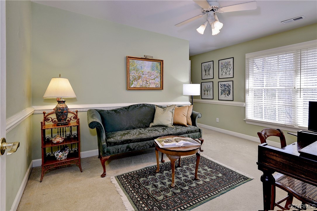 101 Spring Branch Williamsburg, VA 23185 - Photo 19 of 44 a living room with furniture a rug and a window
