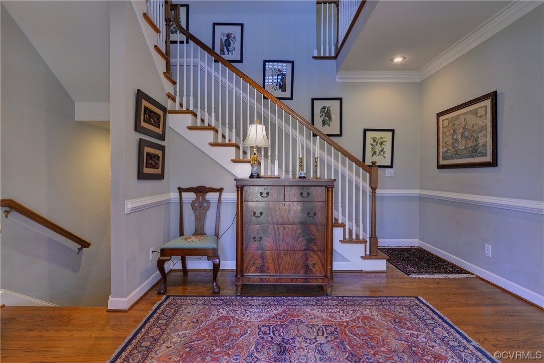 101 Spring Branch Williamsburg, VA 23185 - Photo 2 of 44 a view of staircase with wooden floor and a rug