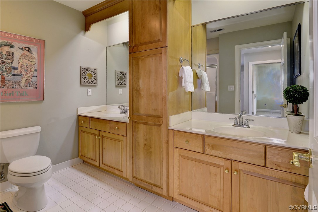 101 Spring Branch Williamsburg, VA 23185 - Photo 27 of 44 a bathroom with a granite countertop sink mirror vanity and toilet
