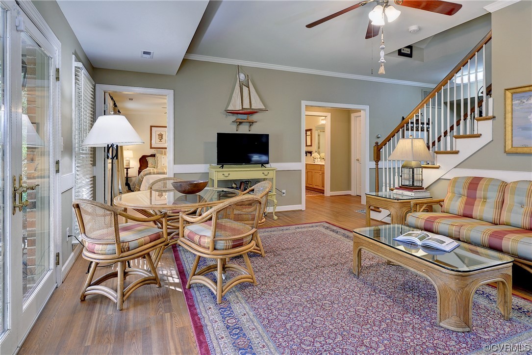 101 Spring Branch Williamsburg, VA 23185 - Photo 30 of 44 a living room with furniture a fireplace and a flat screen tv