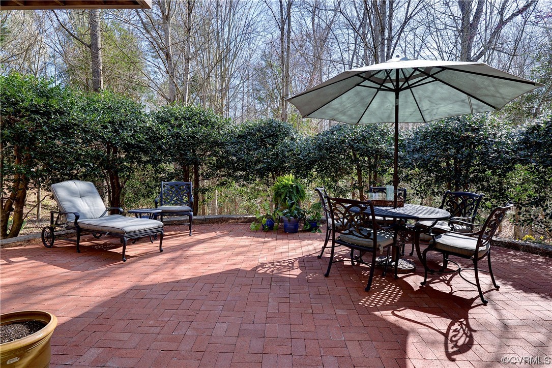 101 Spring Branch Williamsburg, VA 23185 - Photo 39 of 44 a view of a backyard with sitting area and furniture
