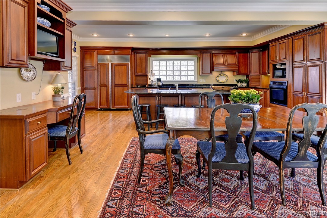 101 Spring Branch Williamsburg, VA 23185 - Photo 10 of 44 a view of a dining room with furniture window and wooden floor