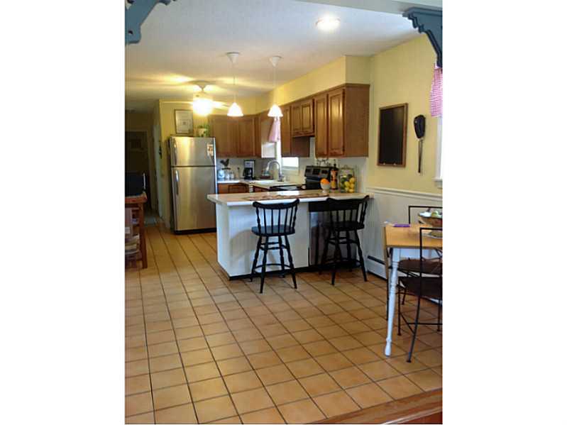 647 Bound Road Cumberland, RI 02895 - Photo 3 of 24 Kitchen. Fantastic eat in kitchen with breakfast bar and SS appliances.