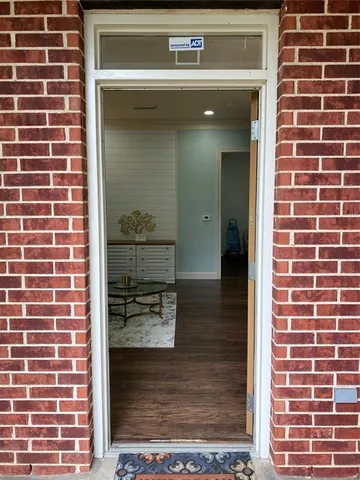 a view of entrance door of house
