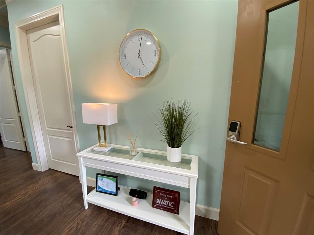 4501 Cartwright Road, Unit 408 Missouri City, TX 77459 - Photo 6 of 10 a room with a table and a mirror