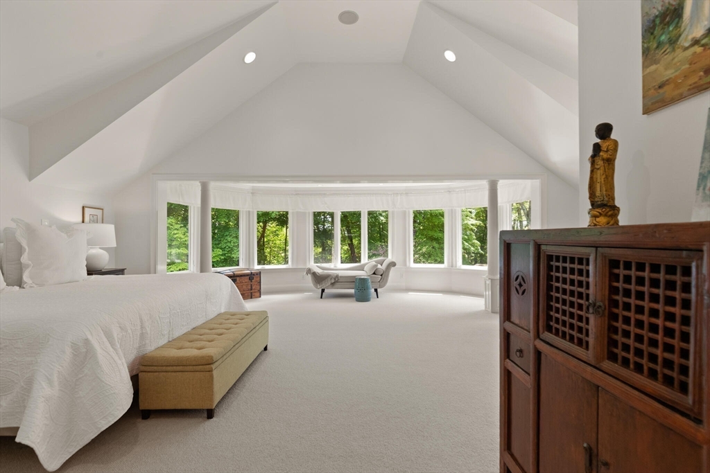 103 Revolutionary Road Concord, MA 01742 - Photo 20 of 36 a bedroom with furniture and large windows