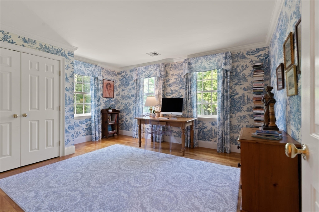103 Revolutionary Road Concord, MA 01742 - Photo 26 of 36 a view of a livingroom with furniture window and a flat screen tv