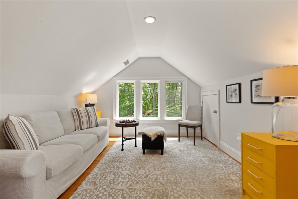 103 Revolutionary Road Concord, MA 01742 - Photo 28 of 36 a living room with furniture and a large window