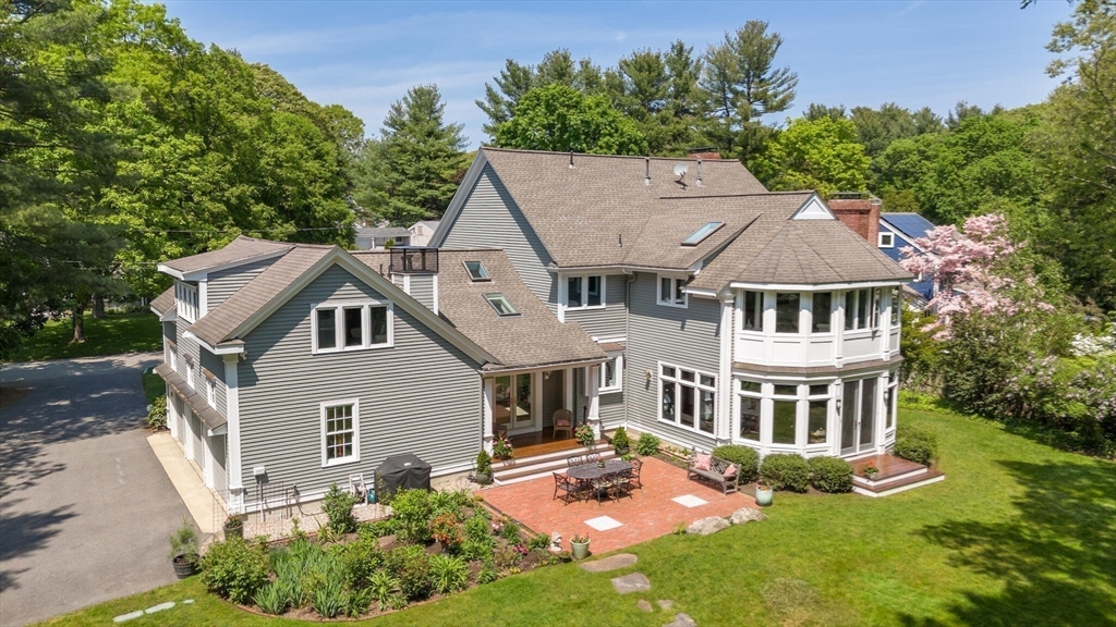 103 Revolutionary Road Concord, MA 01742 - Photo 31 of 36 a aerial view of a house with yard and green space