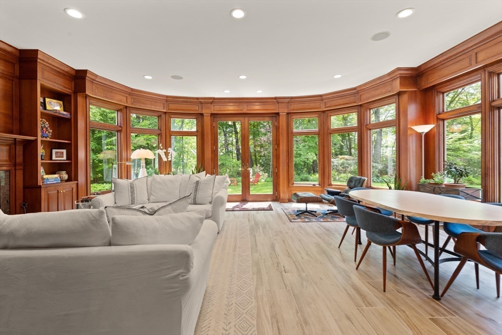 103 Revolutionary Road Concord, MA 01742 - Photo 6 of 36 a living room with furniture and large windows