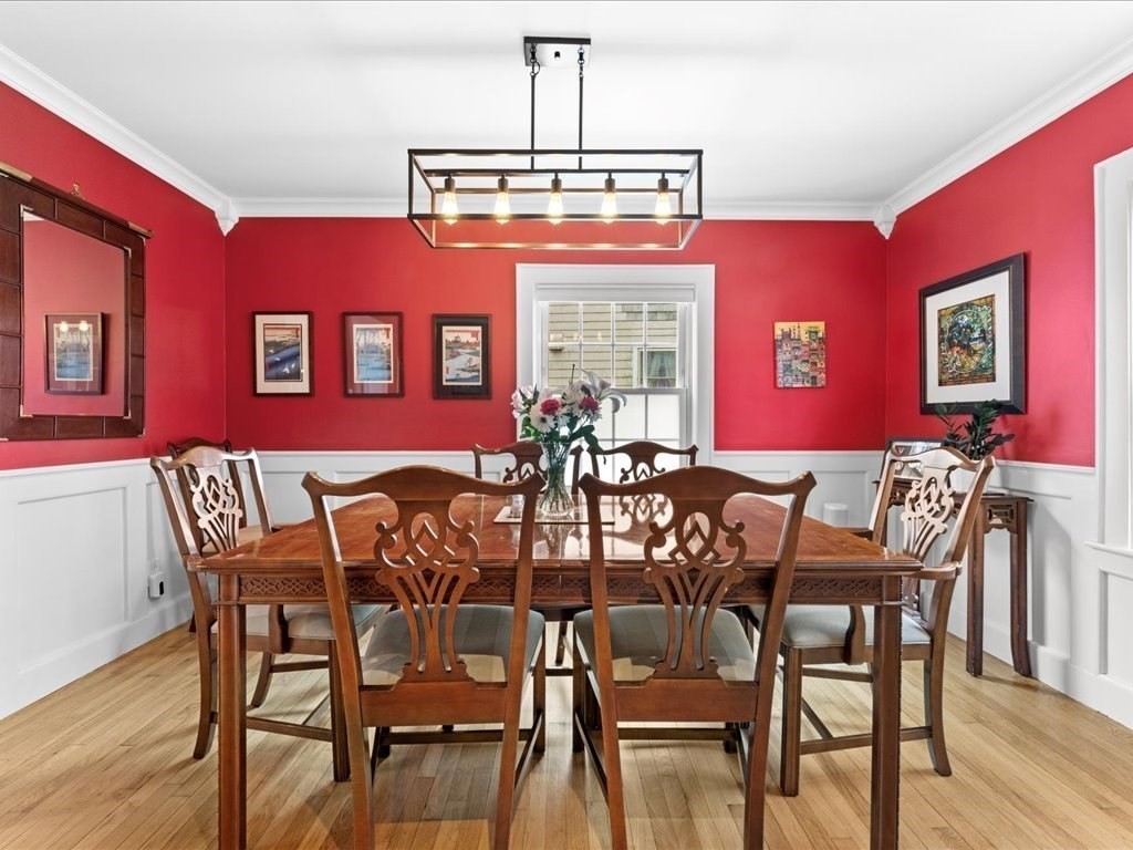 40 Lake Shore Road Boston, MA 02135 - Photo 17 of 39 a view of a dining room with furniture window and wooden floor